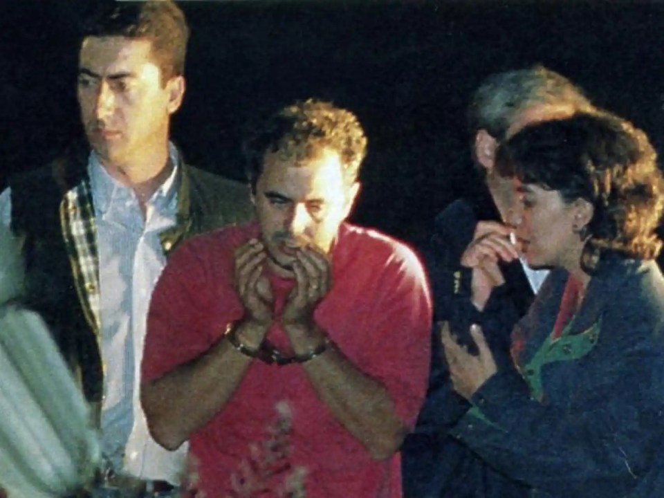 Candido “Candi” Ortiz Aon (in handcuffs) was one of the kidnappers