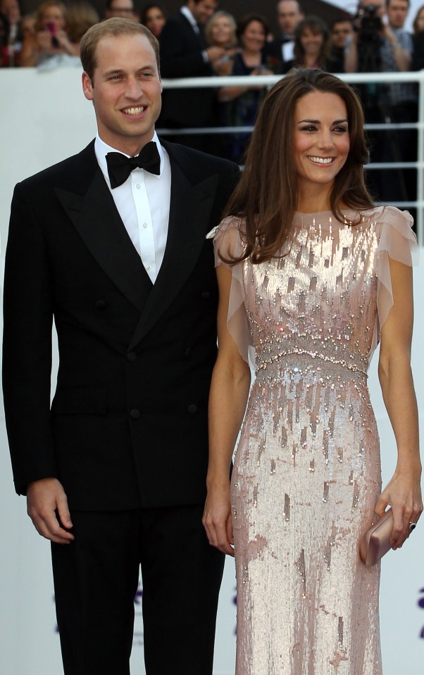 Britain’s Prince William, Duke of Cambridge and Catherine, Duchess of Cambridge, pose as they arrive for a charity gala dinner at Kensington Palace in London