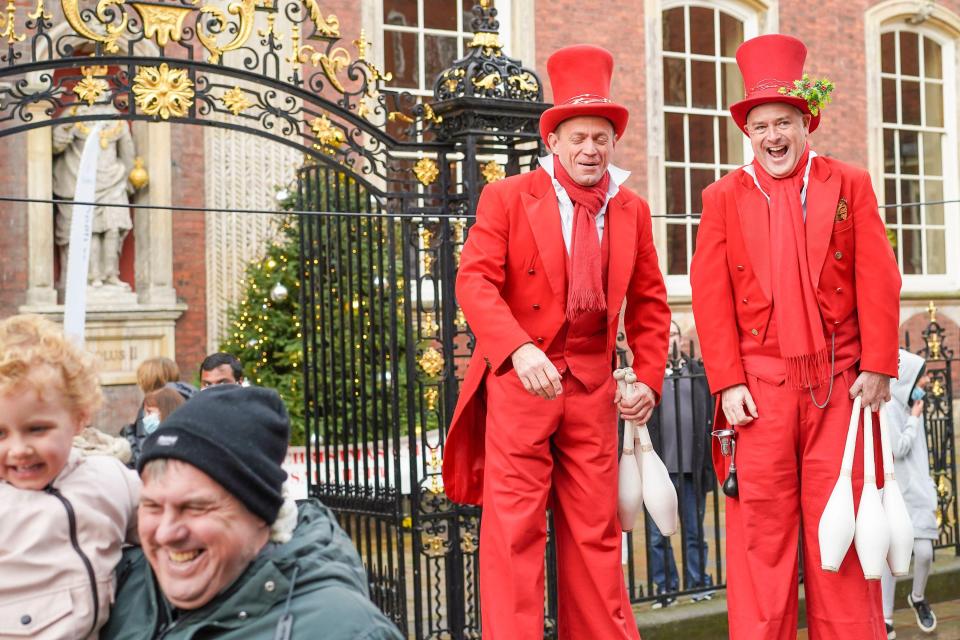 Stilt walkers move through the fayre, keeping visitors entertained