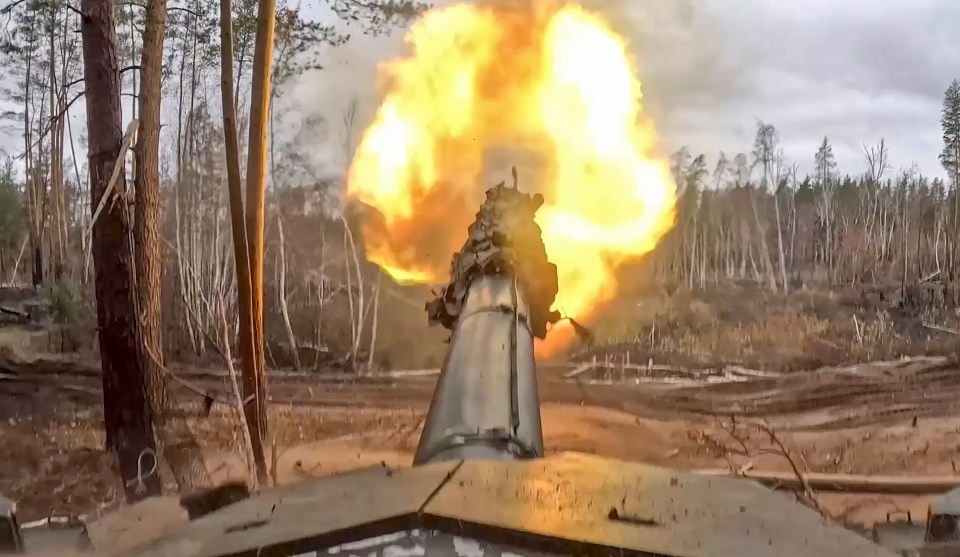 A Russian T90M tank firing towards Ukrainian positions, at an undisclosed location in Russia