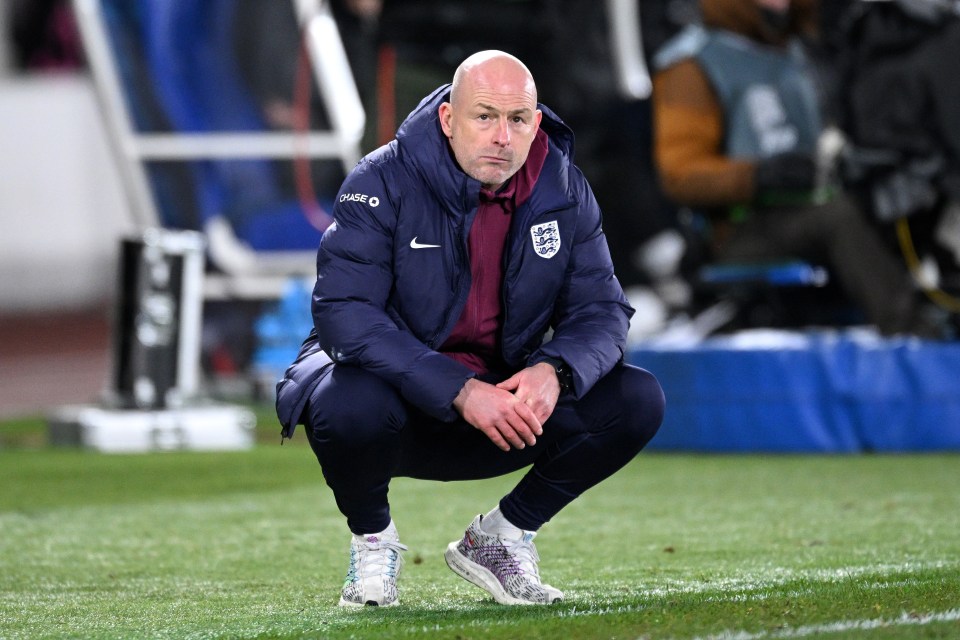 a man wearing a jacket with the word england on it