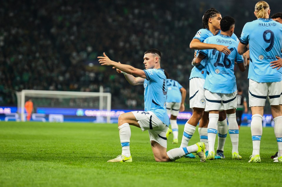 a group of soccer players with one wearing the number 13