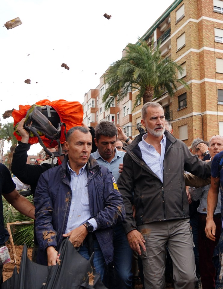 Angry crowds hurled mud at King Felipe