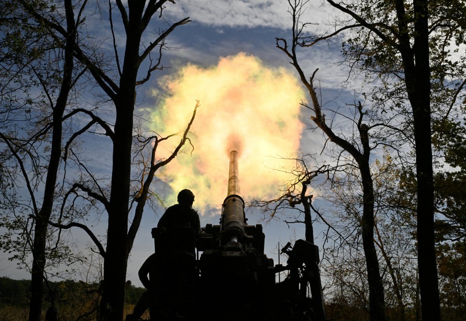 Ukrainian servicemen of the 43 Artillery Brigade fire a 2S7 Pion self-propelled cannon towards Russian positions at a front line in the Donetsk region