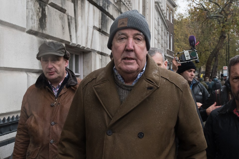 a man wearing a hat that says ' abercrombie & fitch ' on it