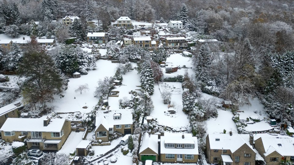 Aerial shots reveal the Derbyshire village of Grindleford after overnight snowfall