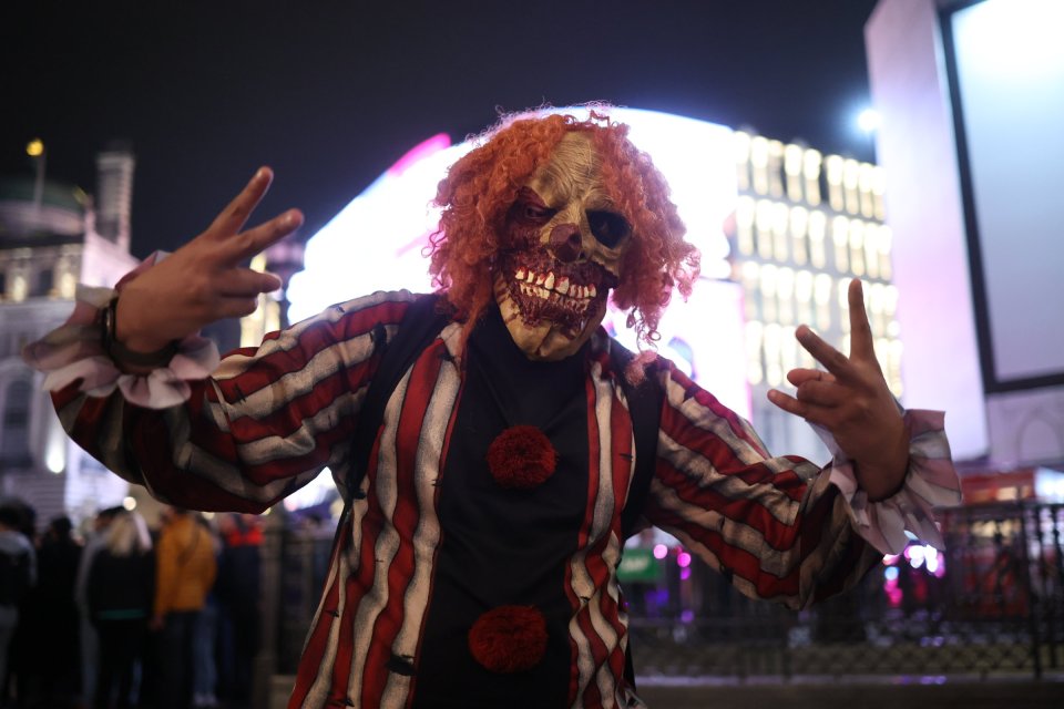 A man dressed to spook others in Piccadilly Circus, central London