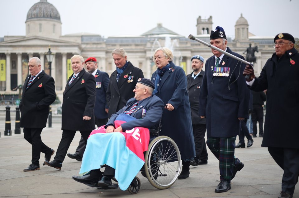 Veterans and servicemen gather in Trafalgar Square