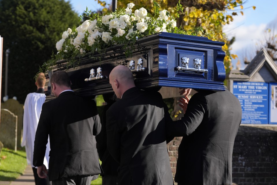 Liam's coffin is carried into the funeral service