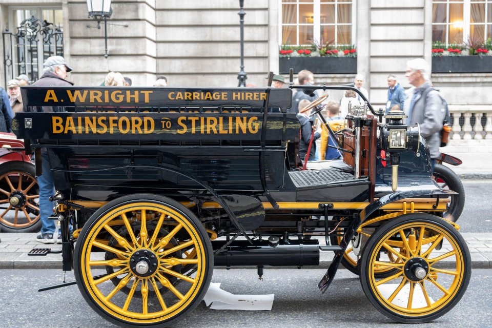 Dozens of old vehicles lined up in Pall Mall