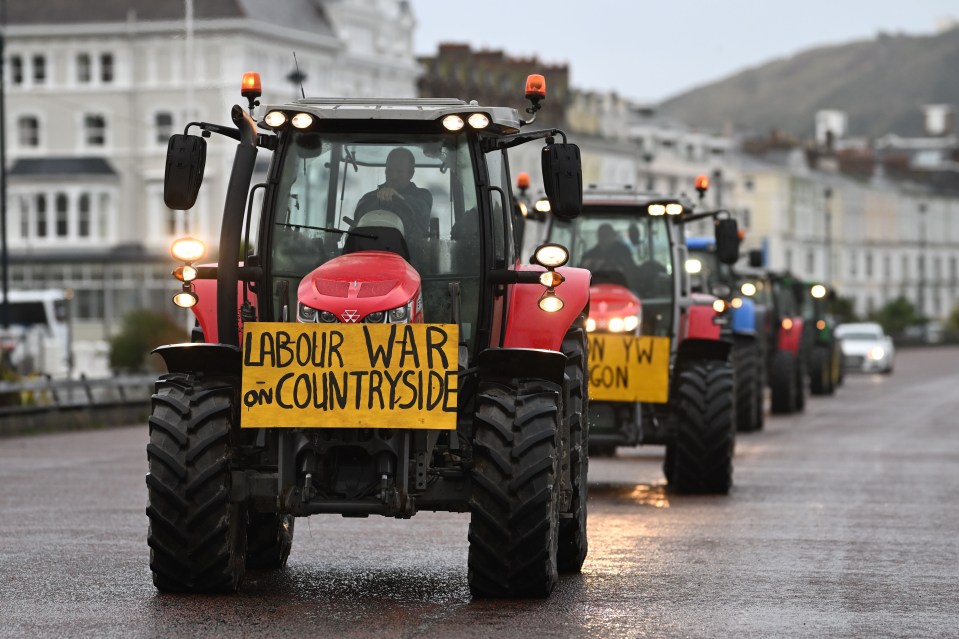 Farmers in their tractors in front of Venue Cymru