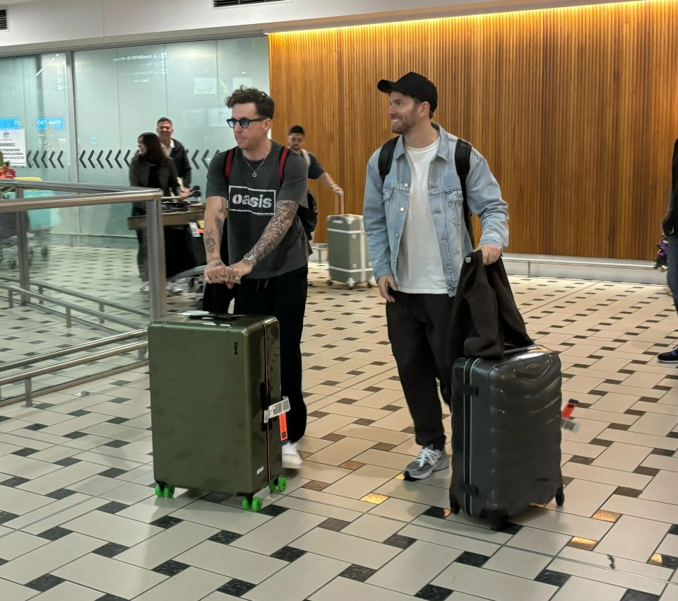 Danny stood with a beaming Joel Dommett in arrivals