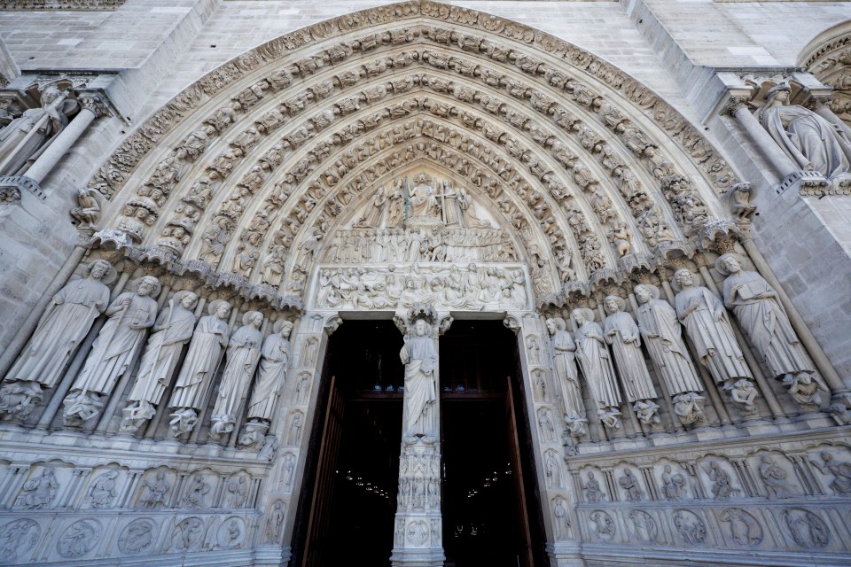 A view of the bas-relief outside of Notre Dame de Paris Cathedral in Paris