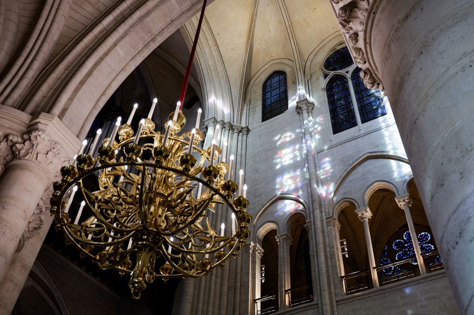 This photograph shows the inside of Notre-Dame de Paris cathedral in Paris