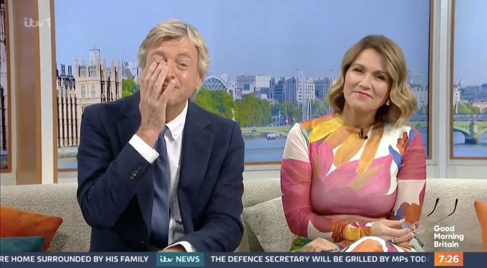 a man and a woman sit on a couch in front of a screen that says good morning britain