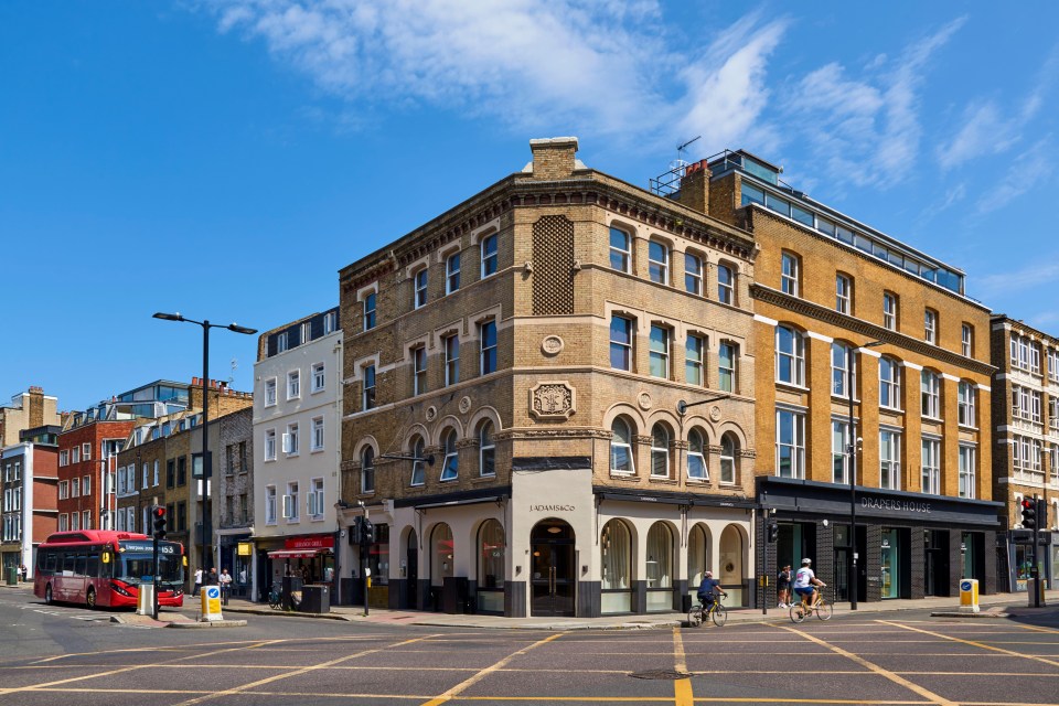 a building with a sign that says ' abercrombie & fitch ' on it