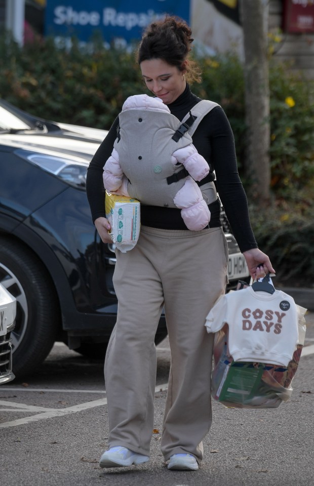 Charlotte smiled at her tot as they headed to the car