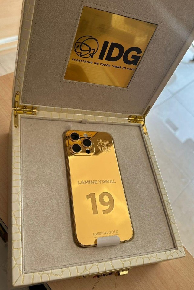 He handed him a £10,000 solid gold iPhone from I Design Gold