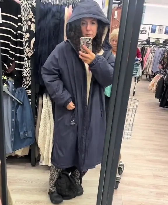 Yianoula, pictured, went viral on TikTok when she spotted a dupe of a popular waterproof jacket