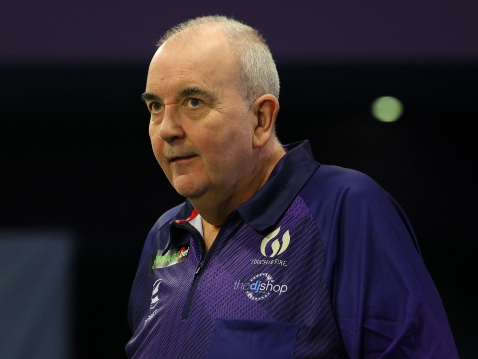 Phil Taylor holds the record with 16 world titles