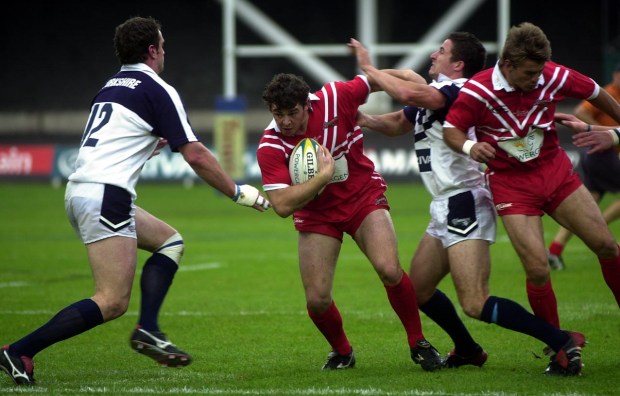 a rugby player with the number 12 on his jersey