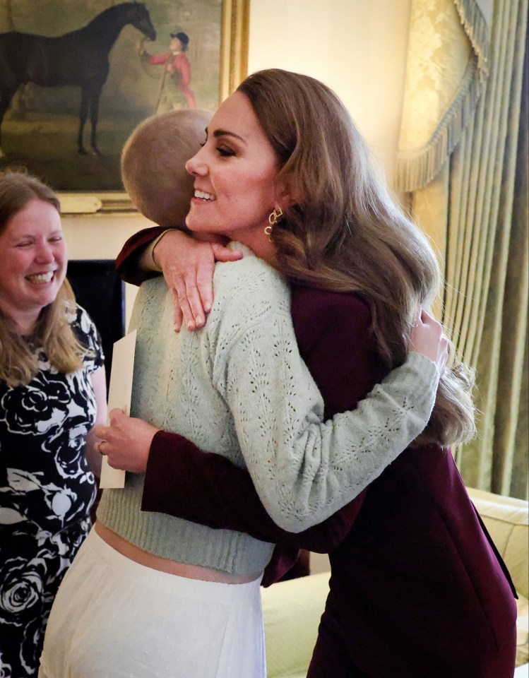 Liz Hatton hugged Princess Kate during a meeting at Windsor Castle