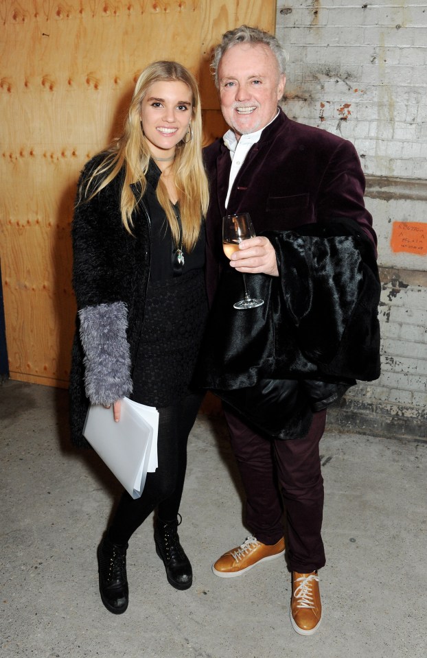 LONDON, ENGLAND - DECEMBER 03:  Tigerlily Taylor (L) and father Roger Taylor attend a private view of Nikolai Von Bismarck's new photography exhibition 'In Ethiopia' at 12 Francis Street Gallery on December 3, 2013 in London, England.  (Photo by David M. Benett/Getty Images)