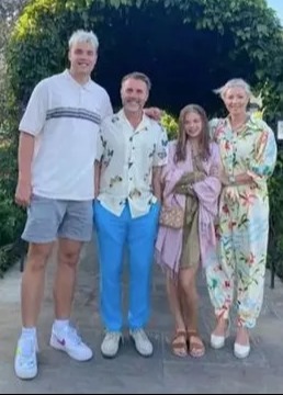 Gary Barlow with his son Daniel (left), daughter Daisy and wife Dawn (right)