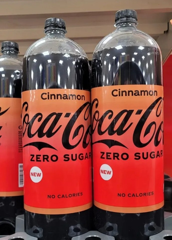 two bottles of cinnamon flavored coca cola zero sugar