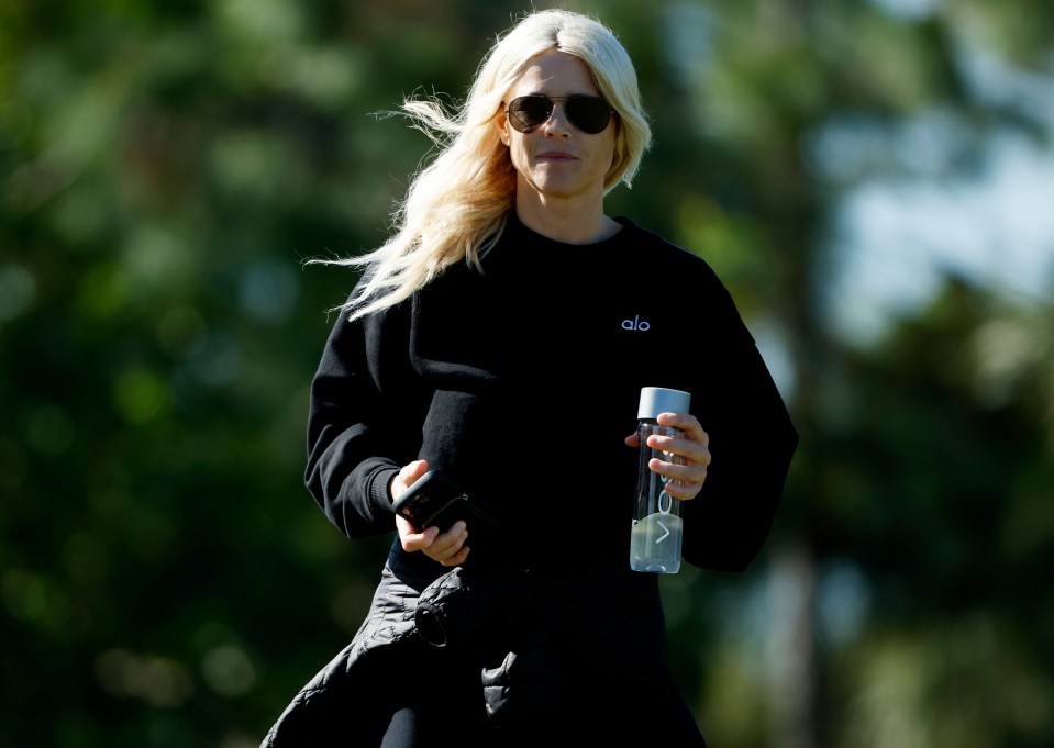 Elin is said to have shared a golf cart with Woods at the Miami course on Monday