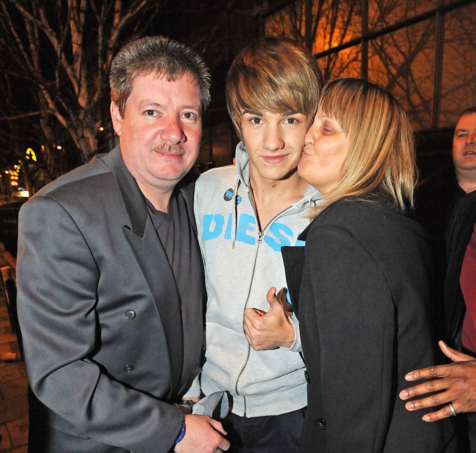 Liam with his doting parents Geoff and Karen