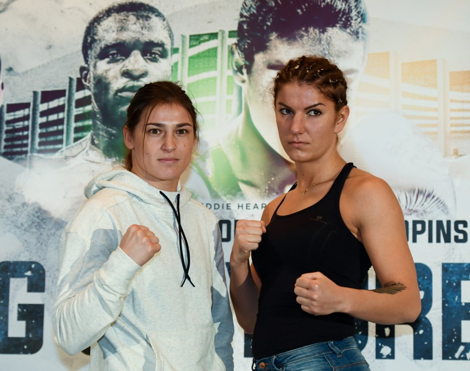 Katie Taylor and Karina Szmalenberg posing following a press conference ahead of their fight