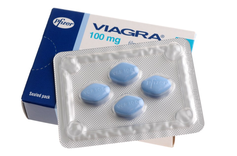 a blister pack of viagra tablets next to a box