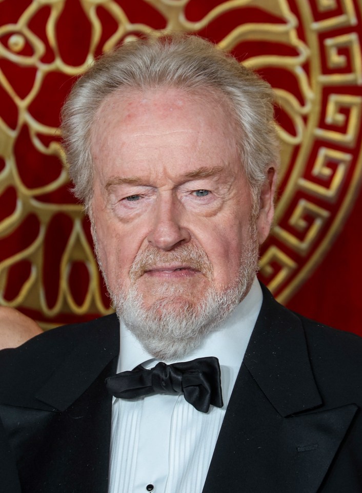 a man with a beard wearing a tuxedo and bow tie