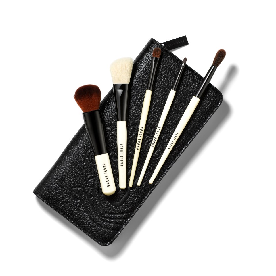 a set of bobbi brown makeup brushes in a black case