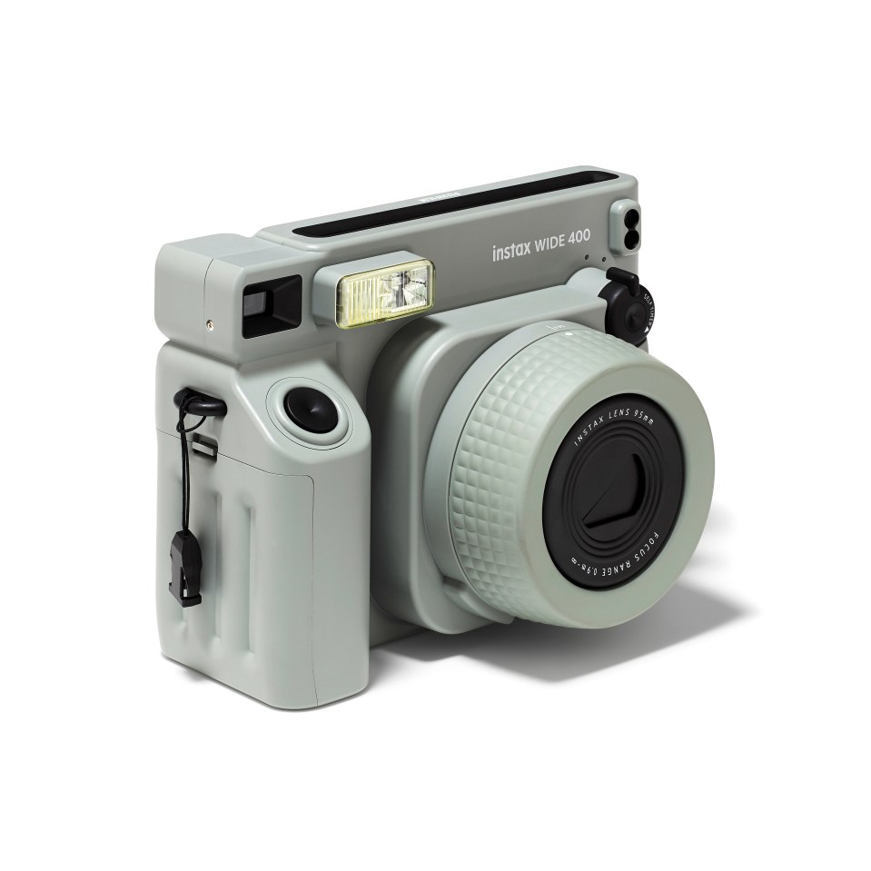 a gray instax wide 400 camera against a white background