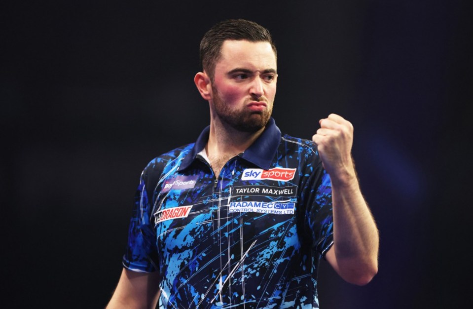 LEICESTER, ENGLAND - OCTOBER 12: Luke Humphries of England celebrates during the Semi-Final match against Ryan Joyce of England during day six of the 2024 BoyleSports World Grand Prix darts at Mattioli Arena on October 12, 2024 in Leicester, England. (Photo by Cameron Smith/Getty Images)