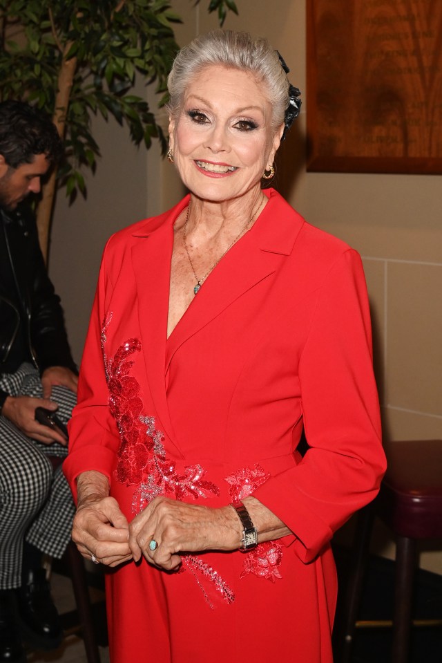 Angela Rippon dazzled in a red jumpsuit as she attended the VIP reception for the late dancer