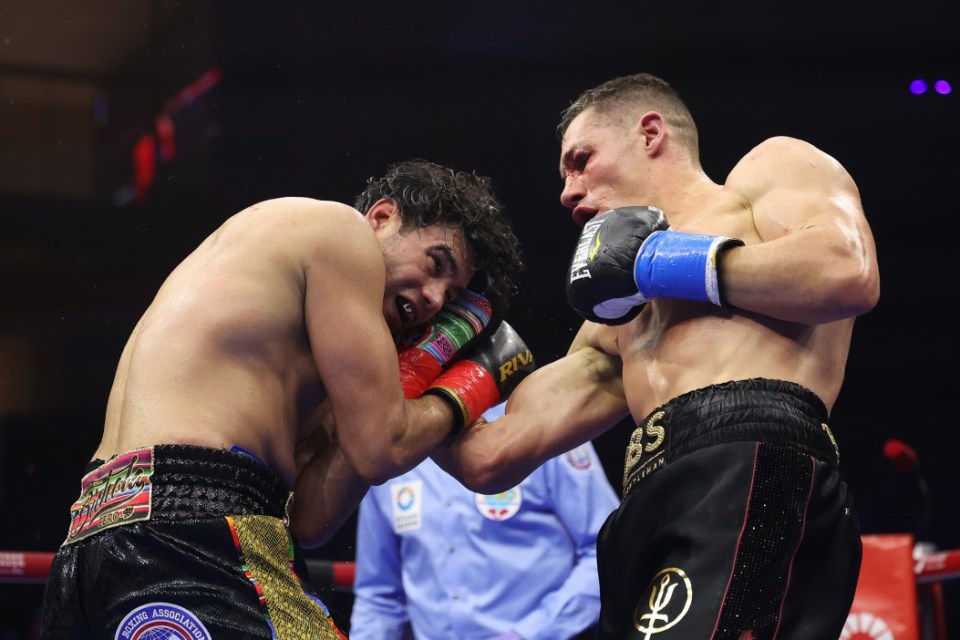 Chris Billam-Smith lands on Gilberto Ramirez during their WBO World Cruiserweight title fight in Riyadh