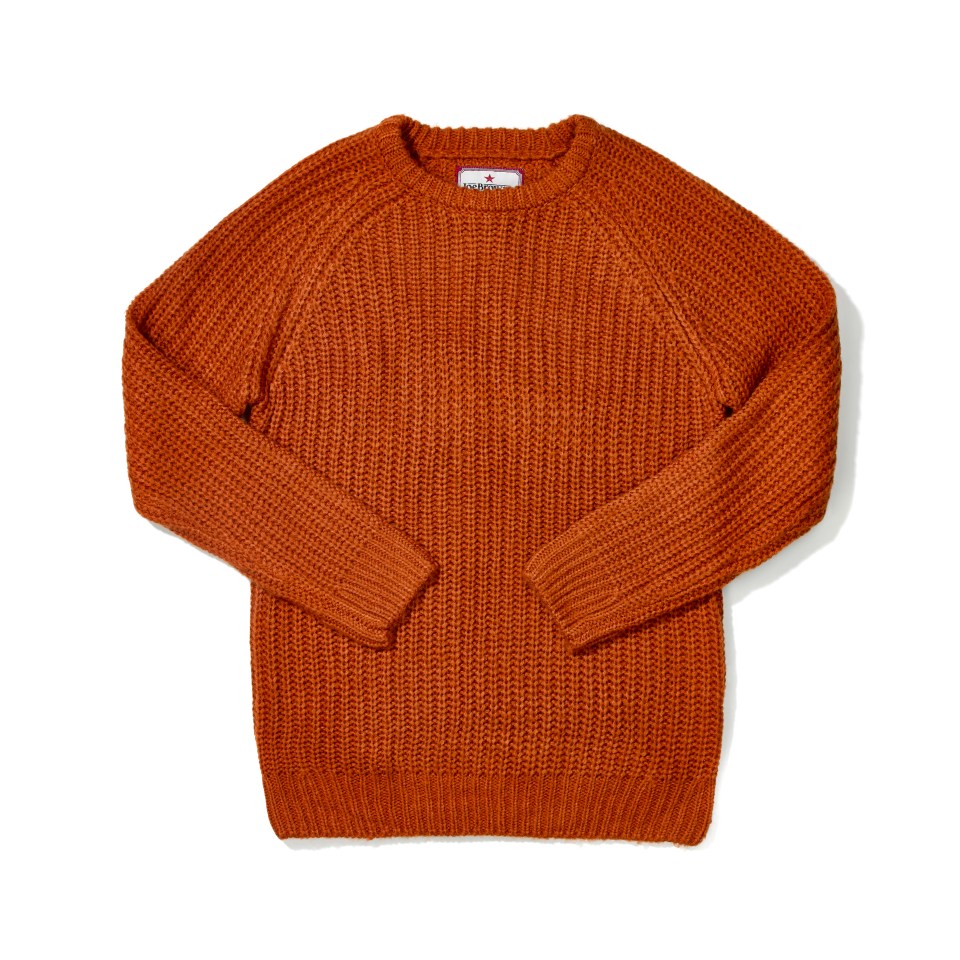 an orange sweater with a label that says ' abercrombie & fitch ' on it