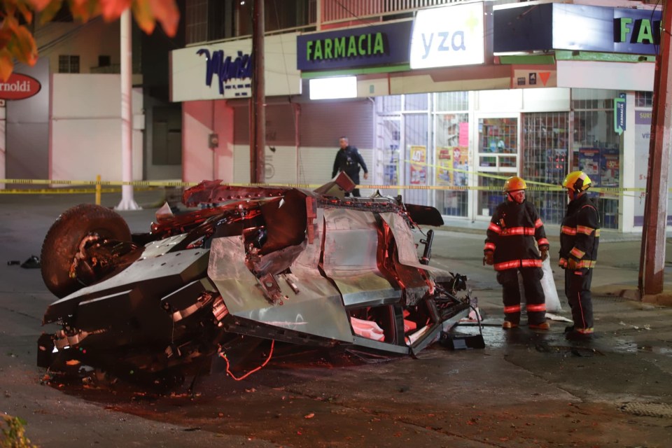 The stainless steel SUV rammed into a statue before flipping over in a nightmare crash