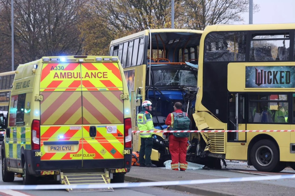 an ambulance is parked next to a wicked bus