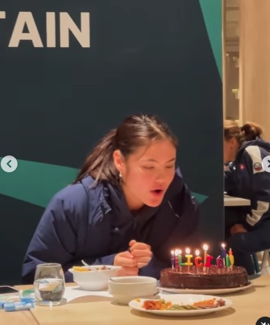 She was gifted a chocolate cake topped with candles