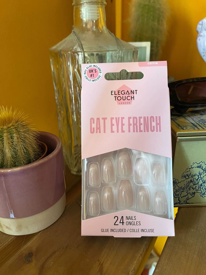 a box of elegant touch cat eye french nails