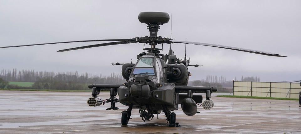 Two soldiers were caught romping in the cockpit of an Apache attack chopper