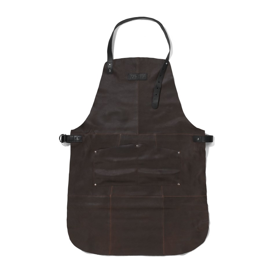 a brown leather apron with a black strap and buckle