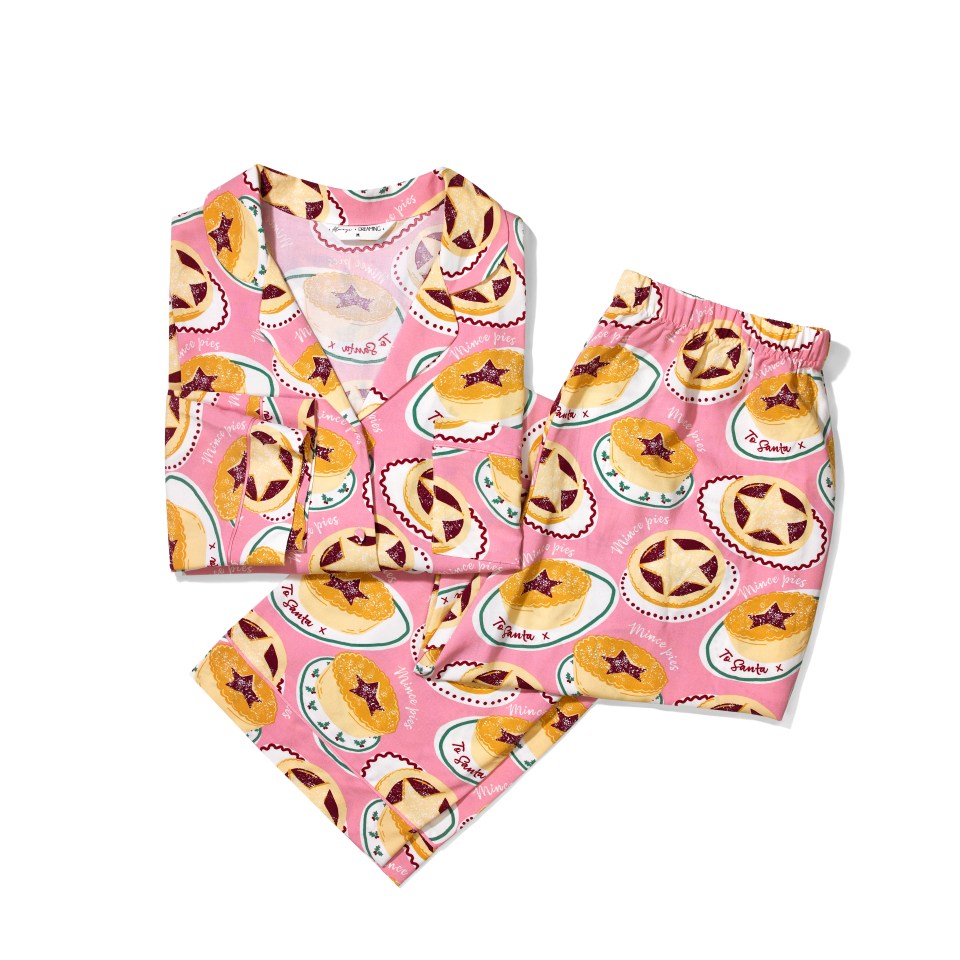 a pink pajama set with a pattern of pies on it