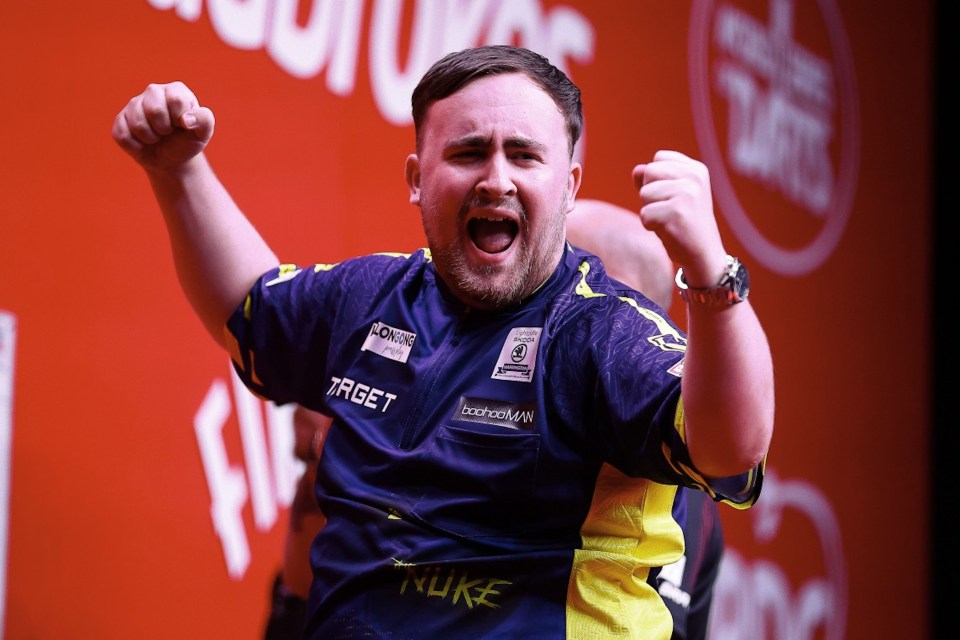 Mandatory Credit: Photo by Kevin Manning/Action Plus/REX/Shutterstock (14612690o) Luke Littler of England celebrates taking a leg in the final; 10th August 2024, Win Sports and Entertainment Centre, Wollongong, Australia; 2024 PDC Australian Darts Masters Day 2. Australian Darts Masters, Wollongong, Australia - 10 Aug 2024