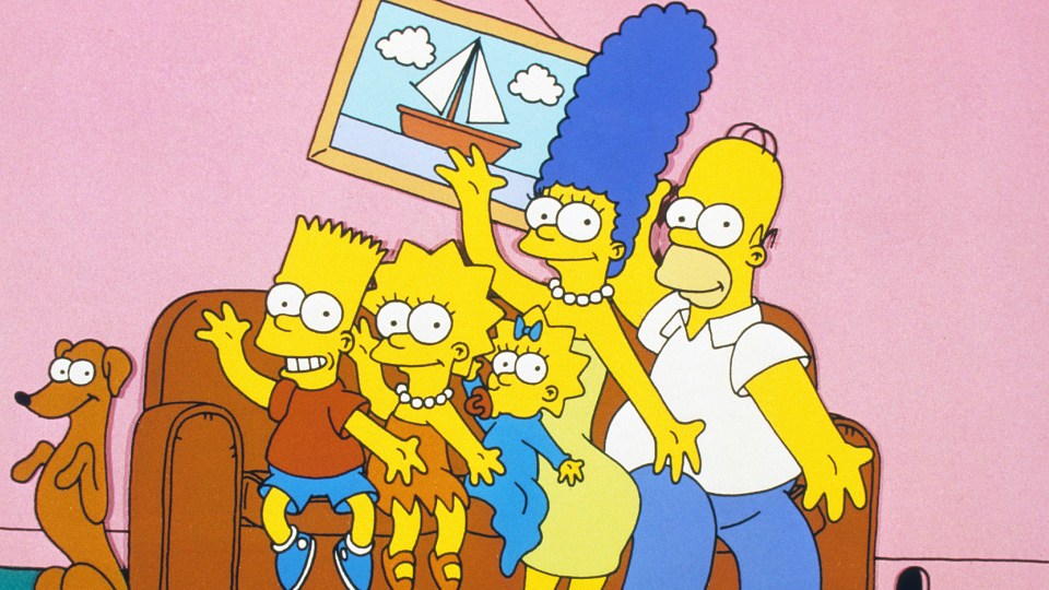 a cartoon of the simpsons posing for a picture