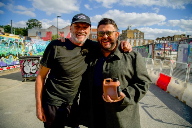 This is an undated handout photo of Adam Richman with the Rib Man from Adam Richman Eats Football. See PA Feature SHOWBIZ TV Adam Richman. WARNING: This picture must only be used to accompany PA Feature SHOWBIZ TV Adam Richman. PA Photo. Picture credit should read: Food Network UK/Rachel Joseph/PA NOTE TO EDITORS: This picture must only be used to accompany PA Feature SHOWBIZ TV Adam Richman